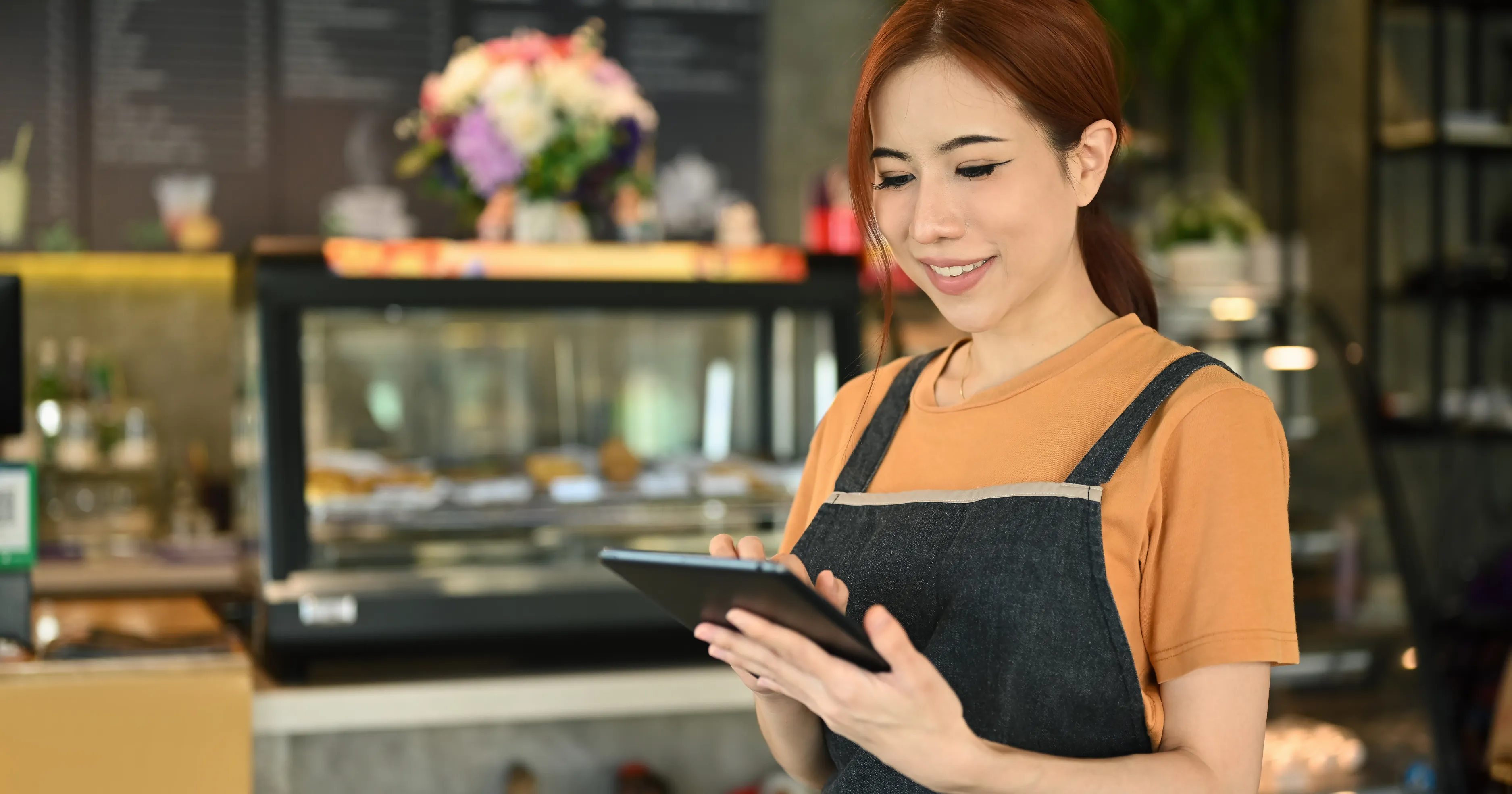 Small business owner using a tablet